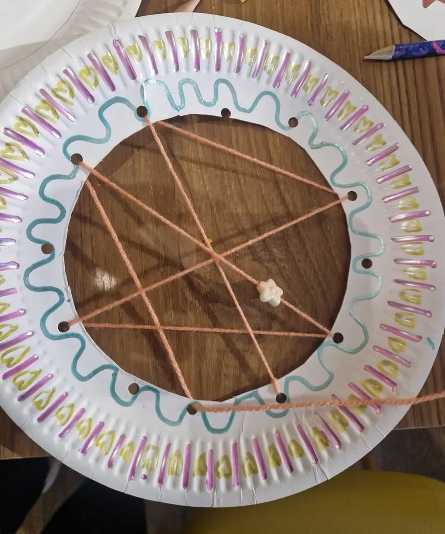 A finished paper-plate dreamcatcher craft